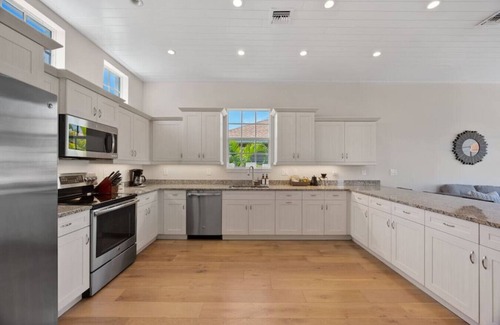 South Island Casa | Waterfront Luxury | Walk to Beach | Heated Pool
