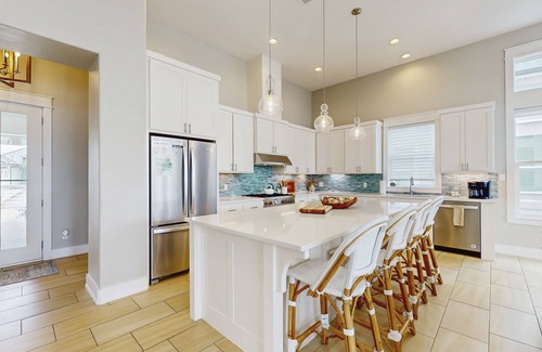 Rockport Casa | Waterfront luxury with private dock, outdoor kitchen, infinity pool & pier