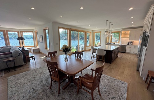 Alton Bay Casa | Waterfront New Construction 4 bedroom home w private U shaped dock Private beach