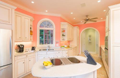 Captiva Casa | Waterfront Pink House with Private Dock & Pool