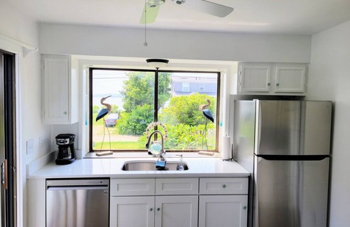 Green Hill Casa | Waterfront Salt Pond House, water view and dock