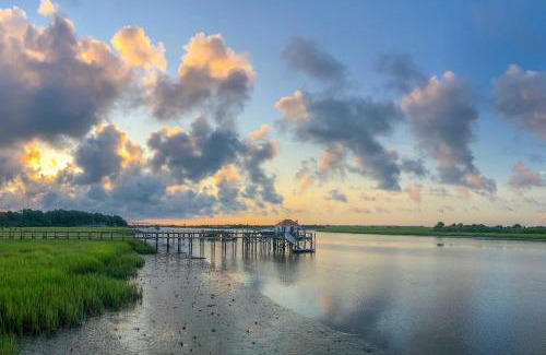 Sea Trail Casa | Waterfront Sunset Beach Escape with Golf View