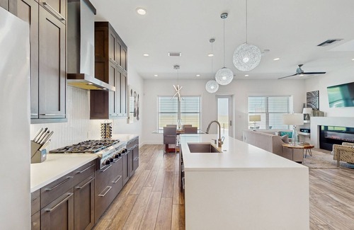 Corpus Christi Casa | Waterfront townhome with dock, canal view & fireplaces - walk to beach