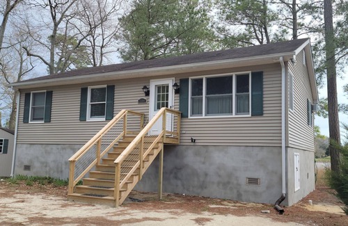 Rehoboth Beach Casa | Waterfront Tranquil Escape-Unifamiliar / Comunidad cerrada / Piscina / Canchas de tenis