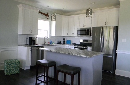 Boiling Spring Lakes Casa | Waterfront Lake with dock and lake access for your kayak at the park.