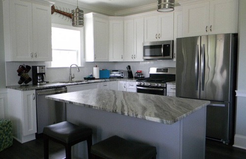 Boiling Spring Lakes Casa | Waterfront Lake with dock and lake access for your kayak at the park.