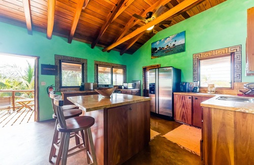 Boca Ciega Casa | Villa frente al mar única con balcón privado y terraza de la piscina: ¡a pie de la playa!