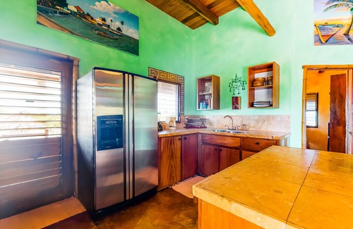 Boca Ciega Casa | Villa frente al mar única con balcón privado y terraza de la piscina: ¡a pie de la playa!