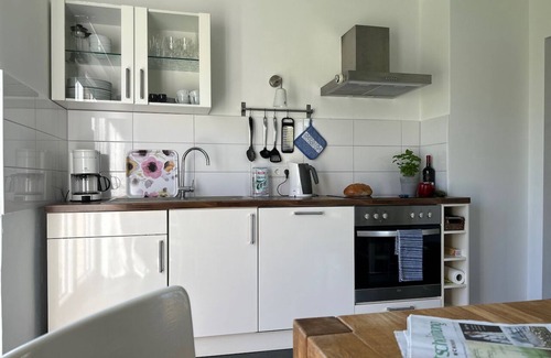 Nordseebad Burhave Apartamento | Wattkante Burhave, Apartment Ebbe & Flut: Danish stove, 70 sqm, near the beach