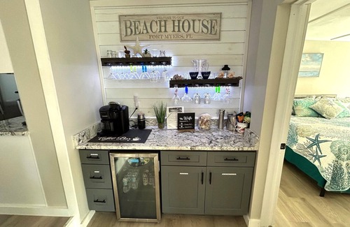 South Island Casa | WE ARE BACK! NEWER POOL/SPA and Walk to beach! Totally updated Canal front home!