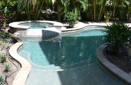 Holmes Beach Casa | A Pearl of A Beach Home - lujosa piscina privada climatizada y spa - para familias