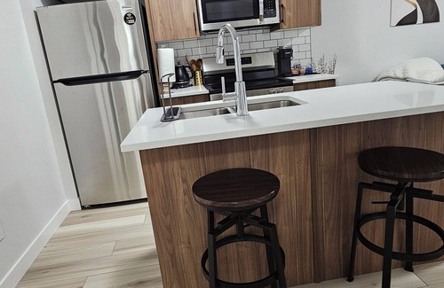 Regina Casa | Welcome to Heartland Suite-Your Modern Retreat in "The Greens"!