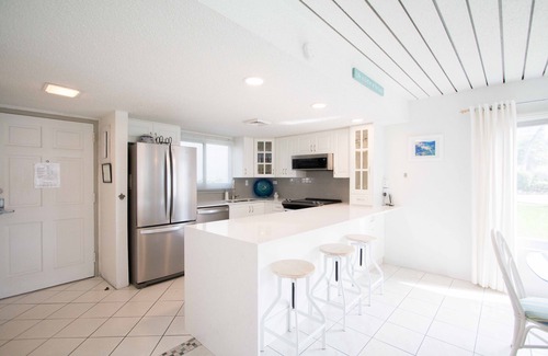 Seven Mile Beach Condominio | Tu casa de vacaciones en la playa te espera! Echa un vistazo a nuestras tarifas de septiembre / octubre de 2019!