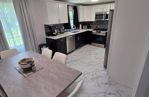 Windsor Locks Casa | Welcome to The Hangar, a newly remodeled travel-themed stay, 4 minutes from BDL.