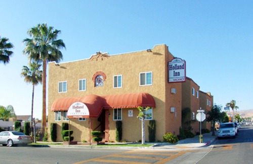 Taft Casa | Bienvenido a la suite Holland inn suites con cama King.