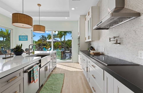 Coral Shores Casa | Welcome to the Bahama Breeze, A Sunny Waterfront Heated Pool Home!!!!!!