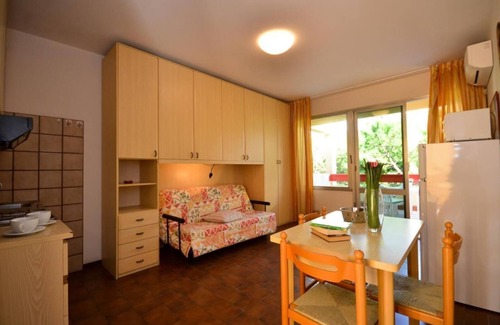 Bibione Apartamento | Acogedor estudio con una hermosa terraza de Beahost Rentals