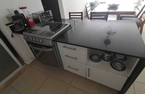 Puerto Juarez Apartamento | Departamento bien equipado y a minutos de la playa