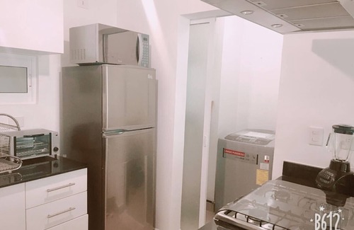 Puerto Juarez Apartamento | Departamento bien equipado y a minutos de la playa