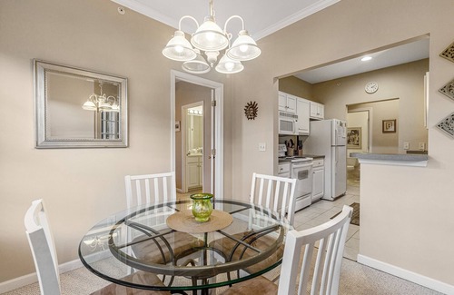 Rehoboth Beach Casa | Well-stocked Creekwood townhome with pool, balcony, board games, W/D, & AC