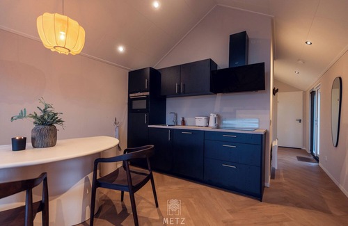 Municipality of Hellendoorn Chalet De Esquí | Wellness Lodge with hot tub in the woods on the Sallandse Heuvelrug