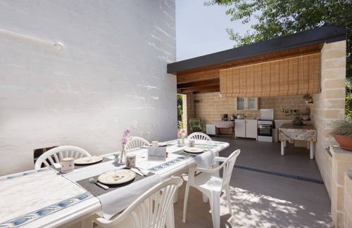 Monopoli Cama Y Desayuno | B & B La Maison-D - Suite Cascata, campo de Monopoli, WiFi, a / c, priv. parque.