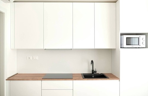 Faro Apartamento | NUEVO en Jesolo con piscina, cerca del mar. Apartamento 4