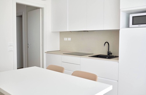 Faro Apartamento | NUEVO en Jesolo con piscina, cerca del mar. Apartamento 4