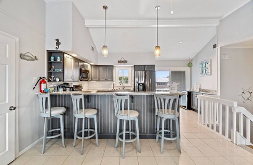 Sandbridge Casa | When you’re at the beach, you want to just relax! Paws and Relax here.