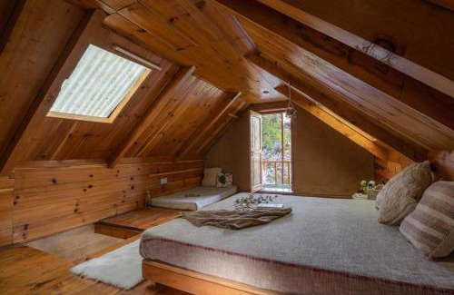 Banjar Casa | Whispering Pines Cottages Cabin by Bastiat Stays