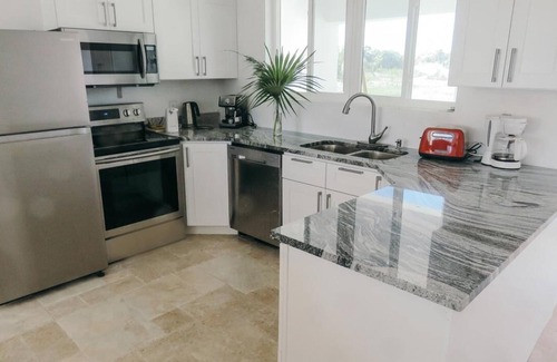 Port Howe Casa | White Ocean Coral - Villa privada en la playa