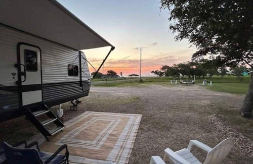 Rockport Casa | “Whooperazzi” The Sunrise Bay View Camper