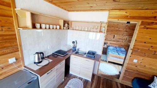 Plociczno-Tartak Casa | Wigierska Buchta (DOMKI)