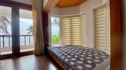 Kannur Casa | Willo Stays On the beach Sea view Ocean Hues holiday home