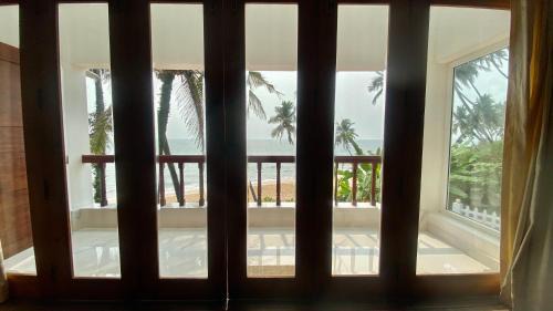 Kannur Casa | Willo Stays On the beach Sea view Ocean Hues holiday home