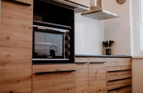 Wolfsburg Apartamento | Wohlfühlapartment, Parkplatz, Boxspringbetten, Massagesessel, Nespresso, 1Gbit LAN & WIFI, Innenstadt