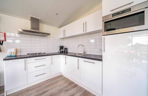 Dordtse Biesbosch Casa | Estupenda casa de vacaciones privada para 4 personas con WIFI, piscina, TV, terraza y aparcamiento