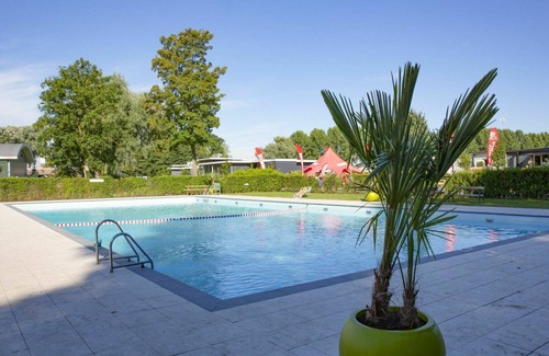 Dordtse Biesbosch Casa | Estupenda casa de vacaciones privada para 4 personas con WIFI, piscina, TV, terraza y aparcamiento