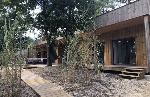 Biscarrosse Casa | Wooden villa in the Golf - Large terrace overlooking the forest - Close to the lake