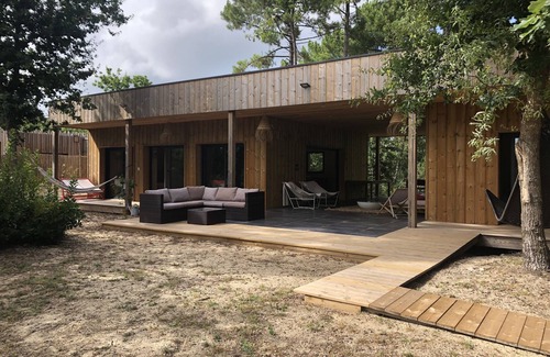 Biscarrosse Casa | Wooden villa in the Golf - Large terrace overlooking the forest - Close to the lake