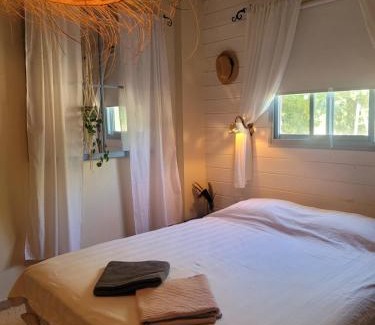 Dan Casa | wooden witch hut by the river
