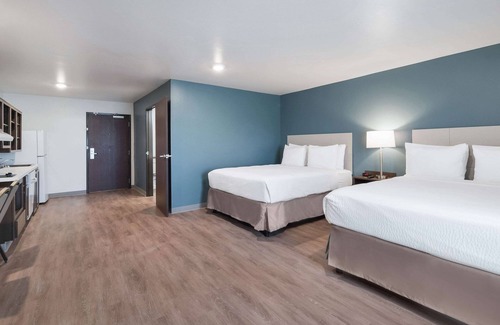Plano Hotel | WoodSpring Suites Dallas Plano Central Legacy Drive