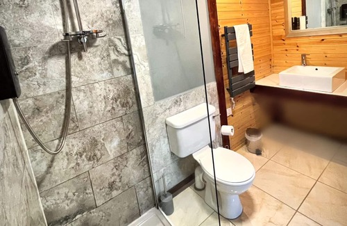 Llanybri Casa | Wren 23-Hot Tub-Woodland Lodges-Tenby-Pembroke