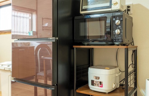 Nara Casa | Free parking and bicycles at "Yamato no Yado Minamibukuro", a 2-story old private house for rent in its entirety, capacity 11 people.