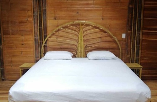 Ballena Cabina | Yogachal Vista Mar bamboo cabiña in jungle w waterfall and seaview yoga deck