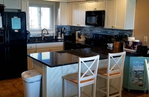 Rodanthe Condominio | Te encantará Sea Glass. Condominio semi-frente al mar. A pasos de la playa. Ropa de cama gratis
