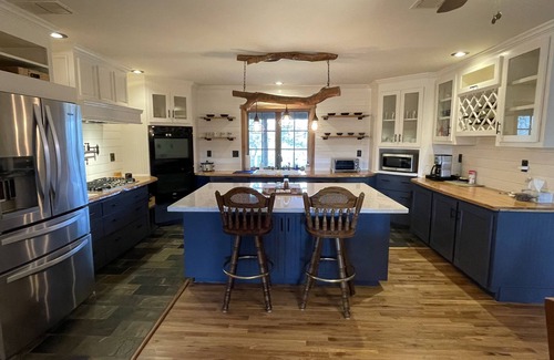 Brenham Casa | Your 12 Acre Farmhouse Retreat - Relax and Unwind by the Campfire and Pond