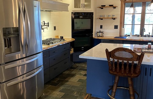 Brenham Casa | Your 12 Acre Farmhouse Retreat - Relax and Unwind by the Campfire and Pond