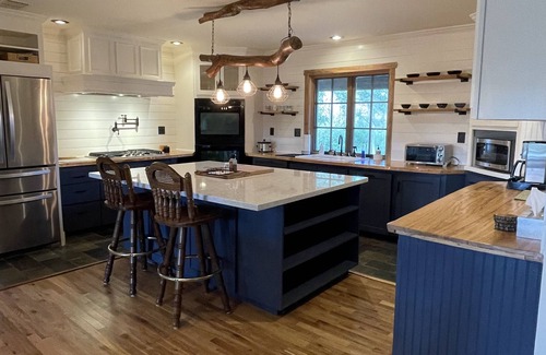 Brenham Casa | Your 12 Acre Farmhouse Retreat - Relax and Unwind by the Campfire and Pond