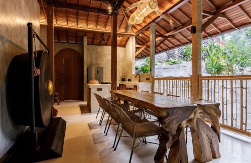 Petulu Villa | Your Exclusive Escape into Nature with Stunning Art Luxury and Riverfront Views